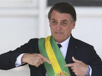 Brazils Bolsonaro begins 27-year jail term for coup bid