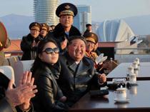 North Koreas Kim vows strategic assets for air force