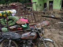 Rain forecasts raise fears in flood-hit Indonesia, Sri Lanka
