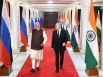 India rolls out red carpet for Russias Putin