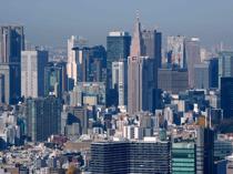 Japan revises economic data to show bigger contraction