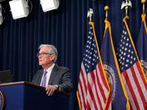 Divided US Fed makes third straight rate cut on jobs risks