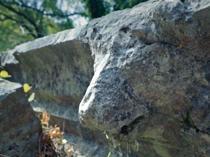 Lion-headed gargoyle destroyed at ancient city