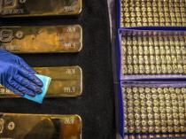 Gold prices rise, oil volatile amid geopolitical tensions