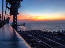 US deploys aircraft carrier as Iran warns against attack