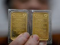 Oil tumbles on Iran hopes, precious metals hit by stronger dollar