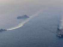 Trump says weighing strike on Iran as Tehran says draft deal coming soon