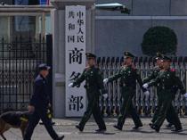 China acts against Japanese companies over military ties