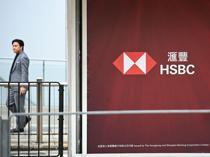 HSBC says its net income fell $1.8 bln to $21.1 bln in 2025