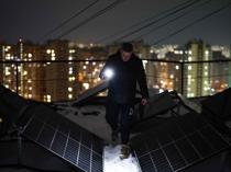 Kiev locals pool together for solar panels, batteries