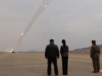 Kim observes rocket launch test with daughter