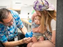 US judge halts implementation of Trump vaccine overhaul