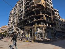 Israel pounds south Beirut, says captured Hezbollah members