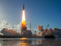 Astronauts begin NASA lunar mission after climactic blast-off