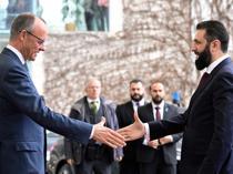 Germany tries to play down row over Syria refugee return