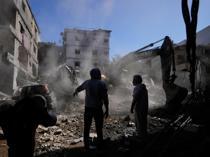 Raid hits Beiruts southern suburbs as Israel says striking Hezbollah