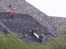 Mexico pyramid gunman kills Canadian tourist, wounds six