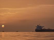 Iran defies US blockade to claim tolls from Hormuz shipping