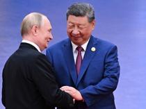 Xi hosts Putin in Beijing days after Trump