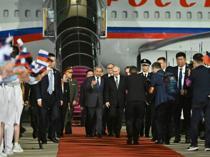 Putin lands in Beijing for talks with Xi