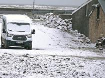 Unseasonal snow hits east ahead of summer