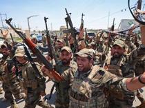 Iraq sets September deadline for integration of armed groups