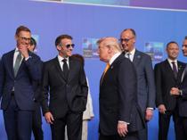 Trump tempers fury to end NATO summit on high note