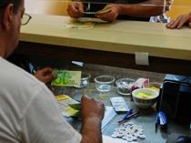 In Isareli-occupied West Bank, too much cash breaks economy
