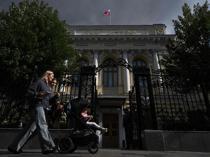 Russian central bank cuts key interest rate despite rising inflation