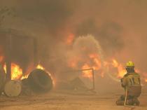 More than 160,000 flee out-of-control wildfires in France, Spain