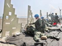 Taiwan begins military drills as China pressure grows