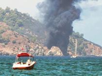 115 jump into sea as tour boat catches fire off Fethiye