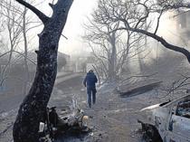 Fires near Athens controlled after claiming two lives