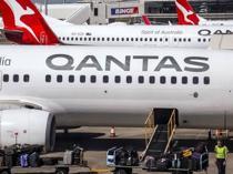 Qantas says profits slump as fuel costs surge