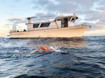 Autistic Turkish swimmer conquers Catalina Channel