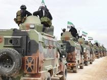 Syria begins SDF heavy weapons handover