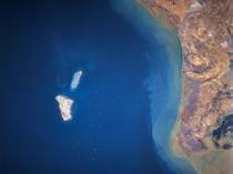 Iranian media report explosions near Kharg Island