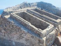Twin sarcophagus carved into giant rock