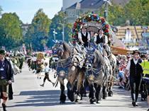 Munich’s Oktoberfest roars to life as the mayor taps first keg