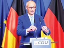 Merz under pressure after bruising state election loss-es