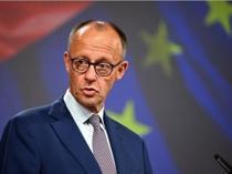 Merz visits Kyiv as Russia urges diplomats to leave