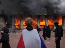 European stocks retreat as France violence spreads