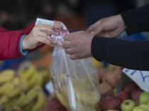Households turn more optimistic on inflation, survey shows