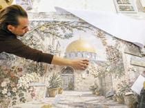 Syrian mosaic artist revives family craft after returning home