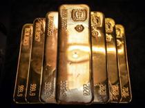 Rising oil prices and inflation weigh on gold
