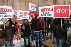 Turkish FM faces protests in landmark Yerevan visit