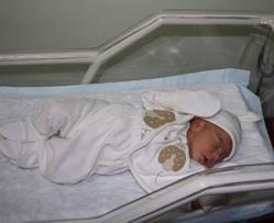 Baby footage causes uproar amid new claims on time and place of birth