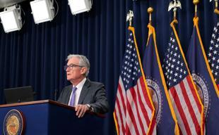 Divided US Fed makes third straight rate cut on jobs risks