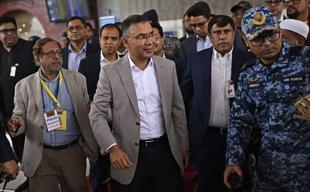 Prime minister hopeful Rahman arrives in Bangladesh