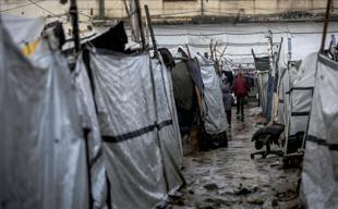 Winter rain floods Gaza camps amid calls for more aid